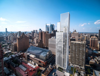 Image of arthaus gallery building daytime facing city hall with kimmel center compressed